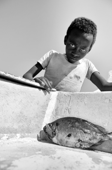 Portrait de garçon et poisson