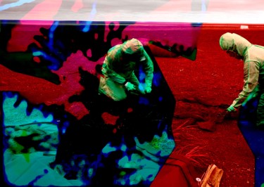 Casey Clark and Nicole Misarti, right, remove the bones... Digitale Kunst mit dem Titel "Casey Clark and Nic…" von Michel Tabanou, Original-Kunstwerk, Digitale Malerei