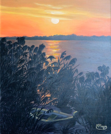 Barque dans un coucher de soleil