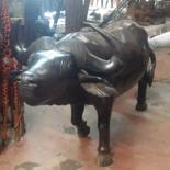 Escultura intitulada "Ebony buffalo" por Obed Omwange, Obras de arte originais, Madeira